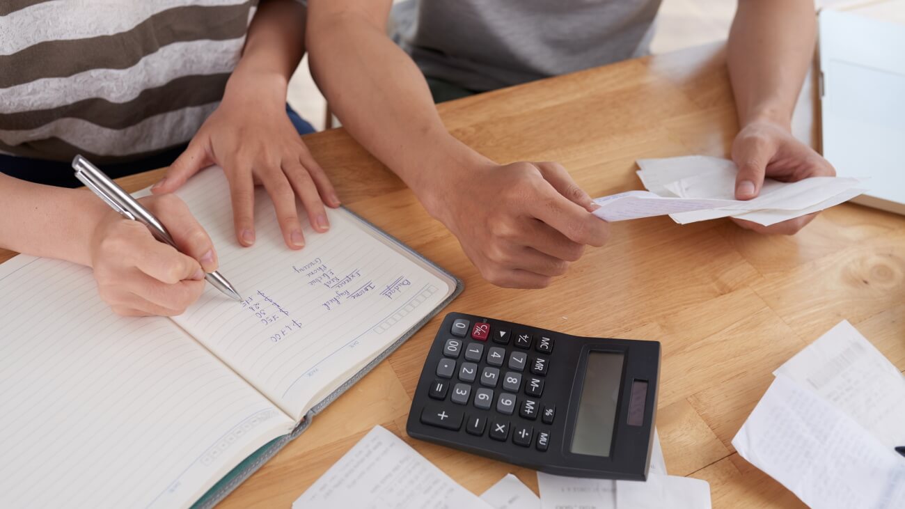 Family keeping records of expenses