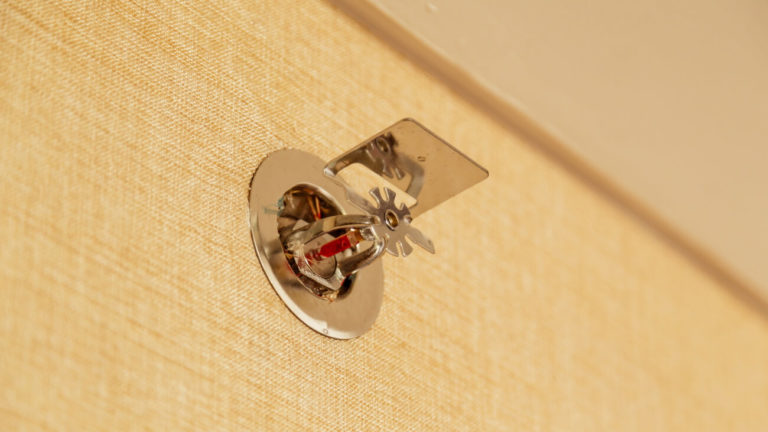 Fire sprinkler on a wall