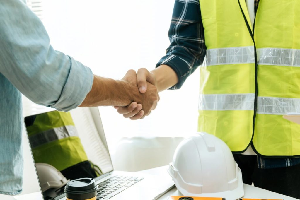 Public adjuster consulting with a couple and answering their questions